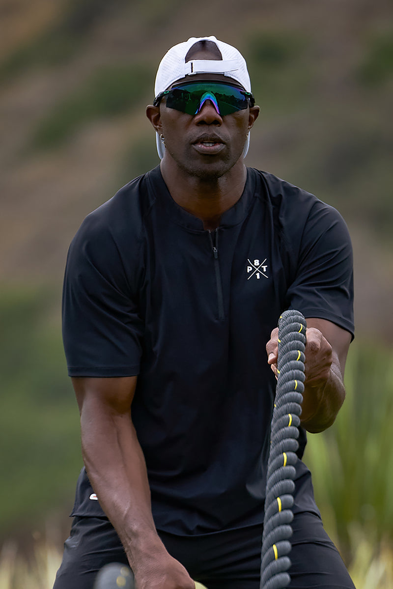 TO Performance Quarter Zip Henley — Black